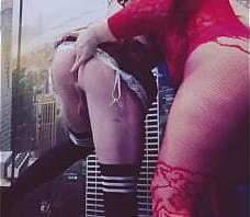 A bitch in red stockings with a big ass fucked bitch