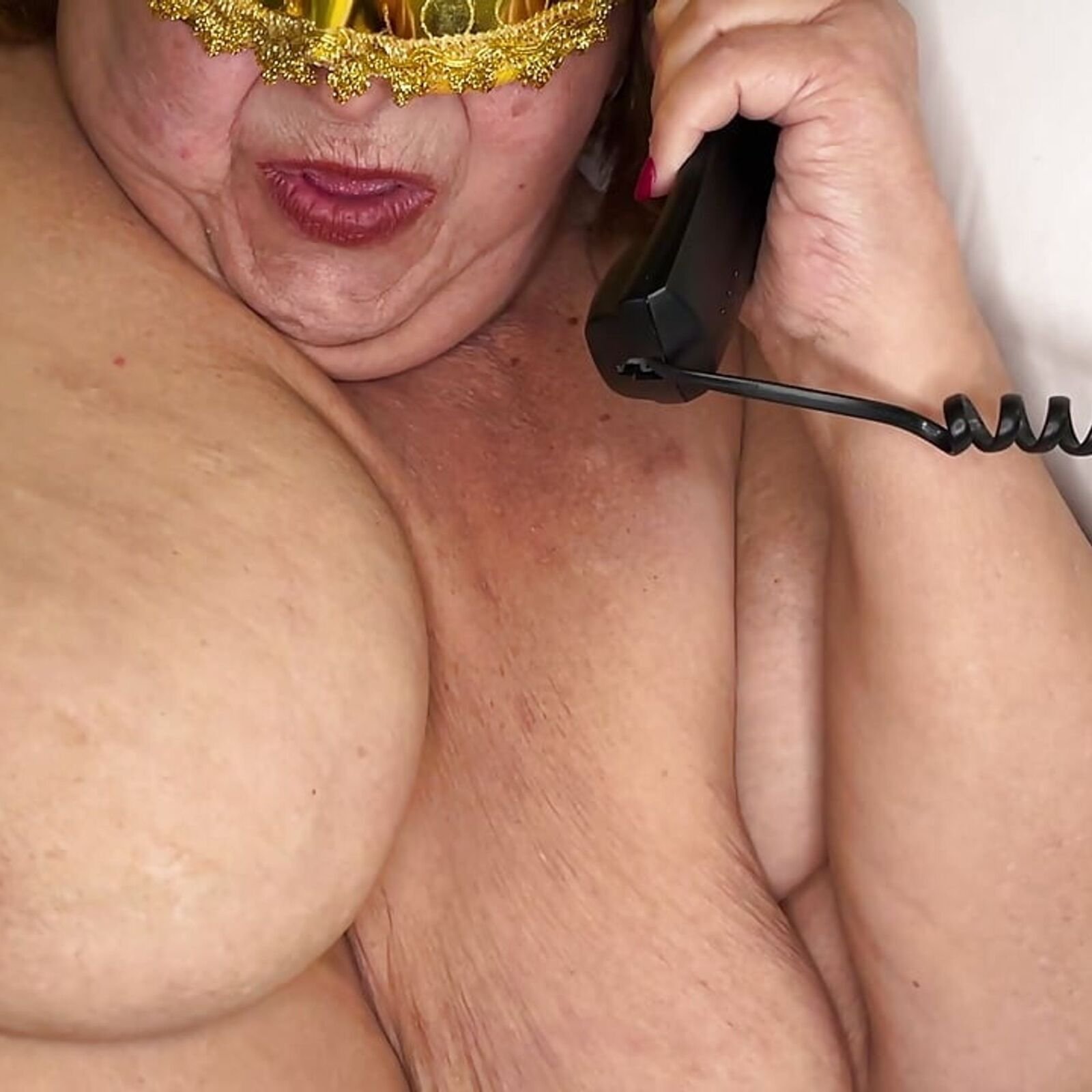 They called the hot line the blonde grandmother and she became very horny and reached an orgasm