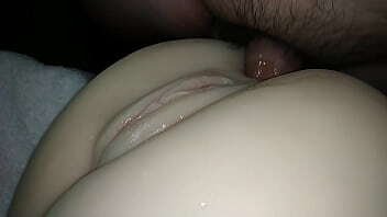 Sexual close-up, cock thrusting in snowy white ass